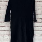 The Vanity Room Long Sleeve Little Black Dress NWT. Stretchy material with pockets. Zipper in back.  34.5” long 16” bust approximately 11” sleeve inseam Photo 5