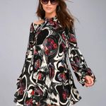 Free People  ‘Drift Away’ cold shoulder black graphic print tunic top, size small Photo 4