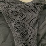 Becca  black bikini bottoms Photo 1