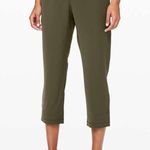 Lululemon  On the Fly Crop Woven 23" Dark Olive Green Pants Photo 7
