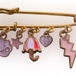 Gold Safety Pin with Pink Charms Photo 0