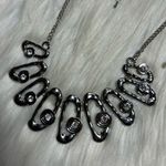 Odd oval faceted rhinestones statement silver tone necklace Photo 0