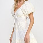 NWT Rubienn Eyelet Tired Back Tie Frill Mini Dress In Off White Size: S pit to pit 8inch Photo 5