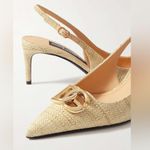 Dolce & Gabbana
Logo-embellished raffia slingback pumps Photo 3