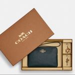 Coach Authentic Leather zip wristlet & 2 charms set Photo 0