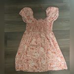 Jessica Simpson Orange and white floral dress Photo 1