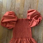 Women’s juniors burnt umber orange midi smocked dress Photo 1