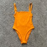 Vitamin A  bright orange low-back one piece swim suit size M NWT Photo 1