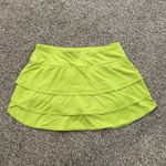 Athleta  neon yellow mini tennis skirt size M Photo 1