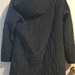 Hilary Radley  Elegant Black Outerwear Photo 9