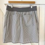 Athleta  Ace Tennis Skort Size 12 Gray‎ White Striped Athletic Golf Skirt Photo 1