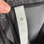 Lululemon black animal print leggings knee length below the knee size 12 Photo 4