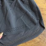 Lululemon black/ dark grey perforated shorts see photo for sizing Photo 1