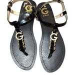 G by Guess Guess black patten leather strap sandals with gold logo on top Photo 0