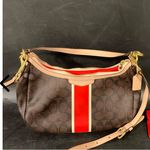 Coach SIGNATURE STRIPE DEMI CROSSBODY. style: F29942. Photo 3