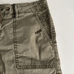 Women's Olive Cargo Shorts. Drawstring with button and zipper. Inseam 4” Size 4 Green Photo 1