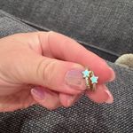 Yellow gold Huggies with rhinestones and a blue star Photo 0