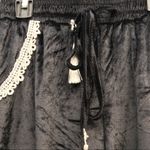 Boutique branded Velvet Jogger Pants with side split
Black Women’s Size Small Photo 2