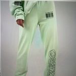 The Mayfair Group IT COST $0 TO BE A NICE PERSON Sweatpants Green Photo 1