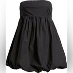 BP black sleeveless mini dress with a bubble hem and bow detail. Size M Photo 1