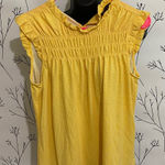 Ariana Grande  Yellow Blouse Photo 0