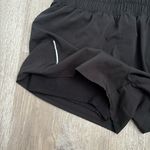 ASICS 2 in 1 running shorts Photo 2