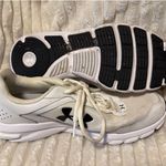 Under Armour  Charged Running Shoes Photo 1