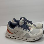 on cloud On Running Women's Athletic Shoes in White, Orange, and Blue Photo 5