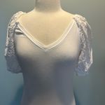 A loves A  white eyelet puff sleeve shirt. Size Small Photo 1
