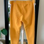 Guess  Yellow Gold Logo Joggers Photo 2