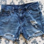 Levi’s Distressed Denim Cutoff Shorts Photo 0