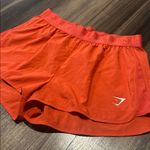 Gymshark Women's Orange Athletic Shorts Photo 1