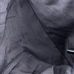 Anthropologie Black Fringe Bag with circle wood handles Photo 4