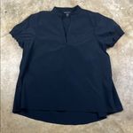 Athleta Levitate Poplin Tee in Black
Size: Small Photo 0