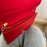 Red Clutch Bag With Bow And Gold Chain Photo 2