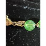 Avon SAQ brass medallion pendant necklace with green and brown beads 18 in VTG Photo 2