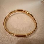 Gold Tone Wave Bangle Photo 1