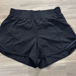 Lululemon  Hotty Hot Short High-Rise Long 4" Women Size 8 Black Photo 0