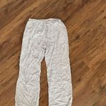 Brandy Melville Anastasia Purple Floral Pants Photo 1