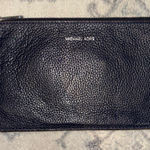 Michael Kors  Jet Set Navy Leather Lg Zip Clutch Wristlet W/O Strap. Leather is in great condition. Easily fits inside a tote. Photo 0