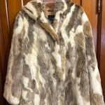 East 5th Faux Fur Medium Length Coat
Brown & White, Different Shades of Brown Photo 0