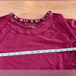 The North Face  women’s long sleeve size medium Photo 5