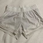 Athleta  Mesh Racer Shorts 4" Photo 0