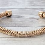 Gold Tone Cuff Bracelet with Light Pink Gem Ends Photo 0