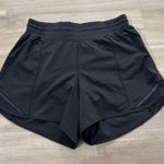 Lululemon  Hotty Hot Short High-Rise Long 4" Women Size 6 Black Photo 0
