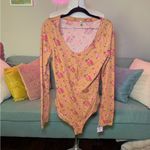 We The Free  Floral Button-Up Bodysuit in Tan and Pink Photo 1