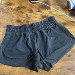 Lululemon black/ dark grey perforated shorts see photo for sizing Photo 0
