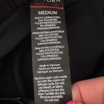 Spyder  Women's Black Athletic Shorts size medium‎ zipper pockets built in shorts Photo 5