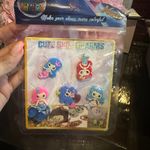 Set of colorful shoe charms including unicorn and cupcake designs. Photo 3