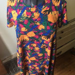 LuLaRoe  yellow flower hi low Carly swing dress Photo 0